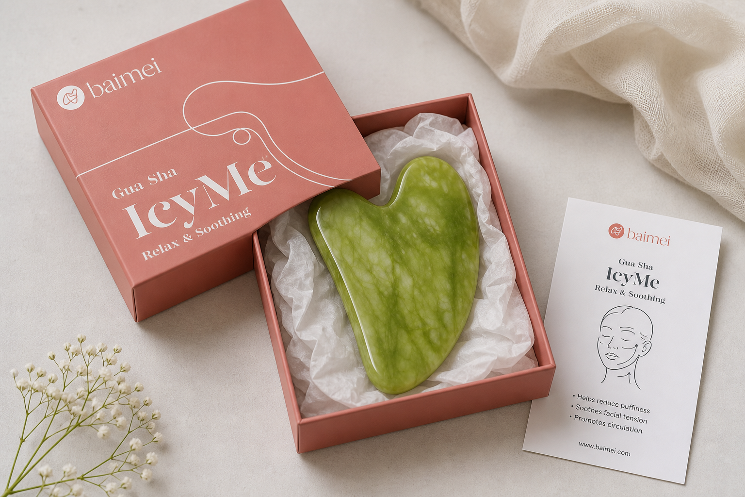 Caja de regalo abierta con la Gua Sha